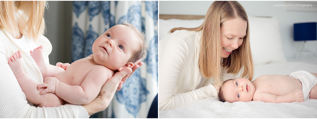 mama-smiles-at-newborn-on-bed